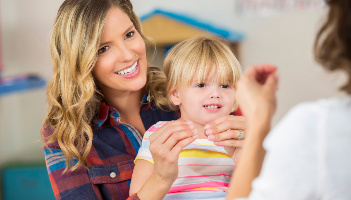 Mum and child learning sign language