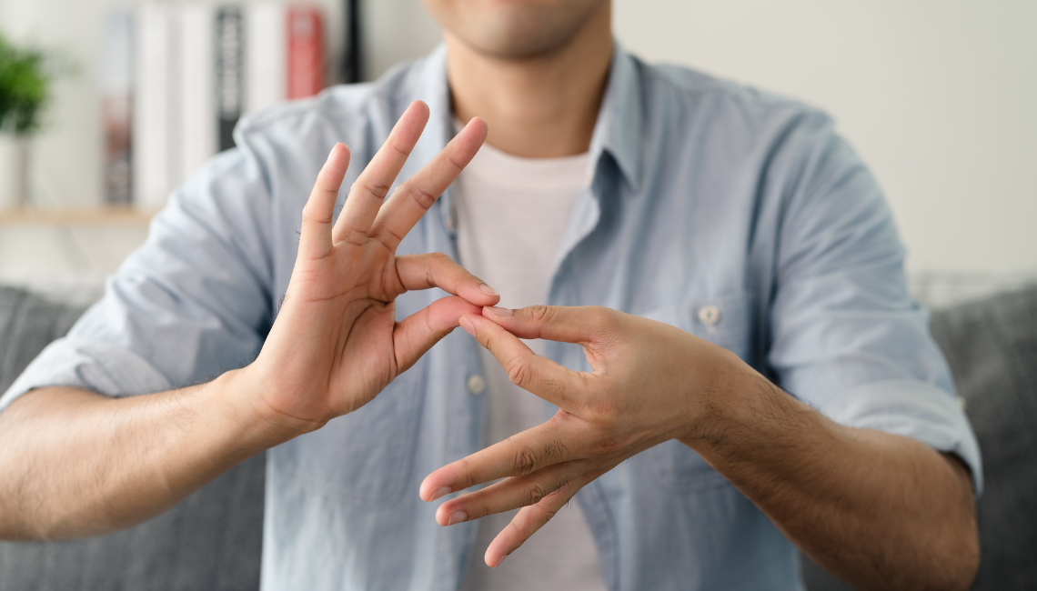A man using sign language