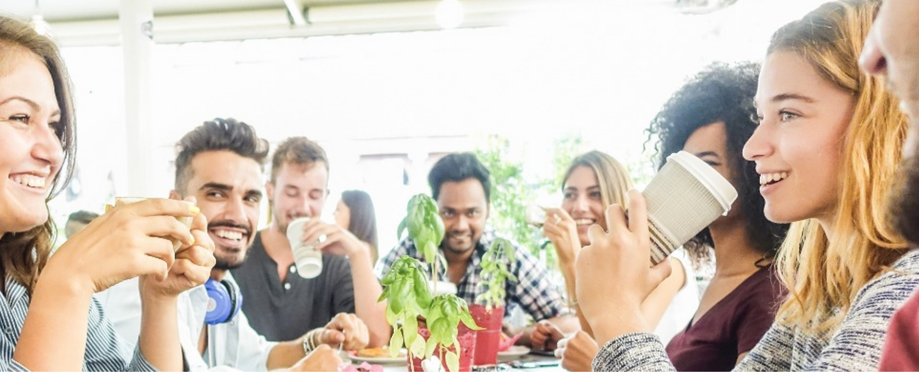 Group of people having tea and coffee, representing a shared silent morning tea in the workplace.